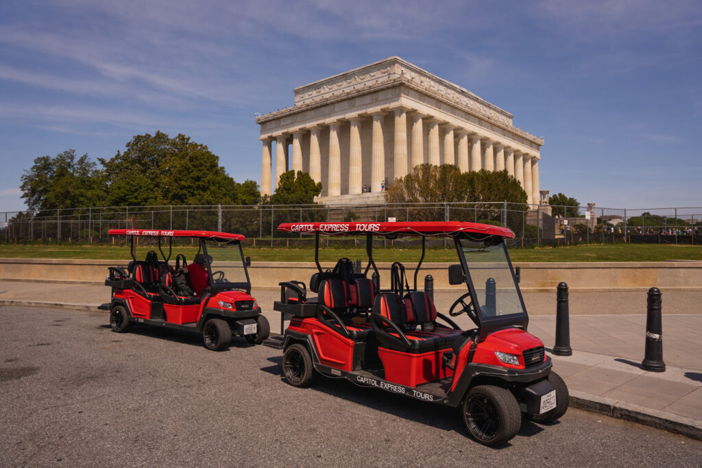Capitol Express Tours Golf Carts in front of Lincoln Memorial. Photo taken by Ted Everett