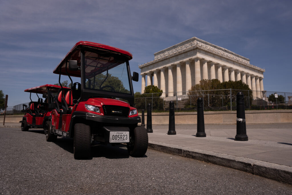 Golf Carts touring in front of Lincoln Memorial. Photo taken by Ted Everett